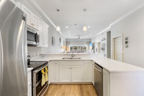 Fridge, microwave, oven, stovetop - Coastal Living Perfected: Banana Bay's Intracoastal Retreat with Sandy Shores (Pensacola)