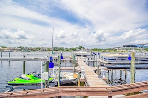 Boats dock at the marina, offering easy access to the water.