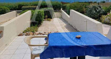 Rez de jardin vue mer avec parking