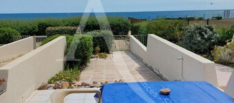 Rez de jardin vue mer avec parking