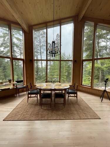 The newly remodeled Stone Cabin with sandy beach and clean clear water 