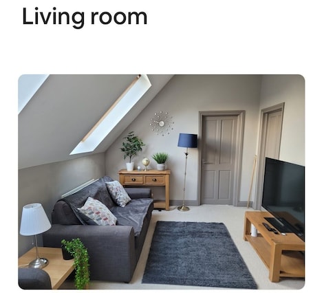 Smart TV. Treetops Loft: TouristNI , approved property.
check in 6pm
check in 6pm