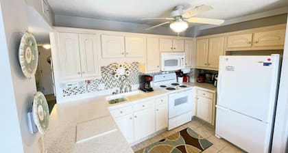 Settle in here! Ocean view 2B/2B, airy & spacious condo. Great amenities!