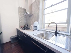 Fridge, oven, stovetop, dishwasher - Casa Triunfo Boutique Apartment Colosseo (Rome)