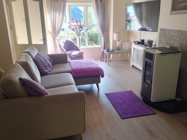 Ferienhaus, Mehrere Betten | Wohnbereich | Kamin