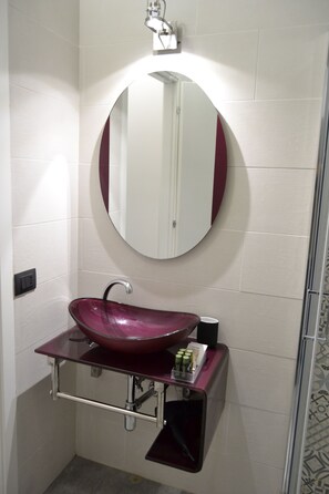 Hair dryer, bidet, towels, soap