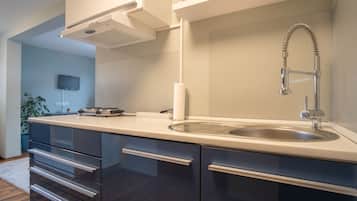Condo, baño privado | Cocina privada | Artículos de limpieza