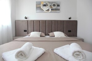2 habitaciones, tabla de planchar con plancha, wifi y ropa de cama 