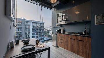 Fridge, microwave, stovetop, coffee/tea maker