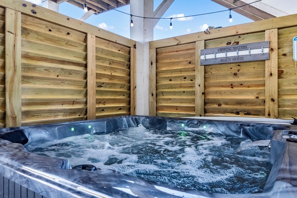 Private hot tub w/lights is part of the fun and relaxation on the ground floor.