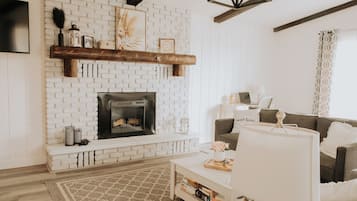 Smart TV, fireplace, books