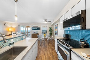 Full-sized fridge, microwave, oven, dishwasher