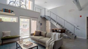 Apartment | Living area | 43-inch Smart TV with digital channels, TV, Netflix - CozySuites TWO Stylish Apts Monument Cir (Indianapolis)