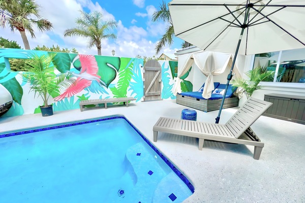Lounge by the gorgeous pool and enjoy the ocean breeze from the cabanas.