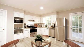 Fridge, coffee/tea maker, highchair, cookware/dishes/utensils
