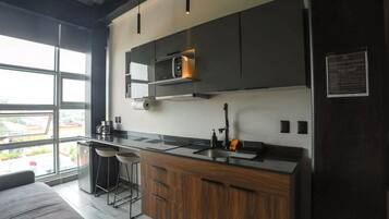 Microwave, stovetop, coffee/tea maker, toaster