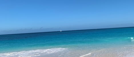On the beach, sun loungers, beach towels