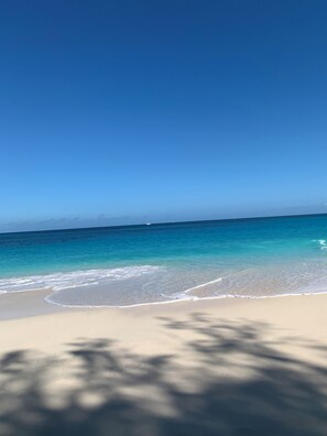 On the beach, sun loungers, beach towels