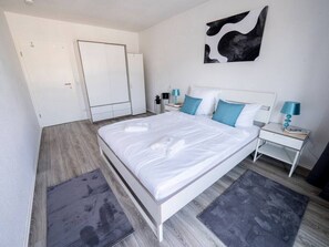 1 bedroom, desk, iron/ironing board, travel crib