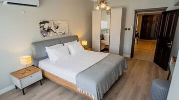 Elite Apartment, 4 Bedrooms, City View | Premium bedding, individually decorated, individually furnished, desk