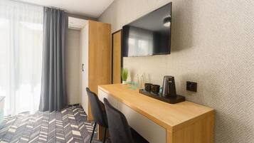 Desk, free WiFi, bed sheets