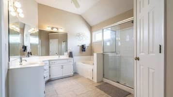 Bathtub, hair dryer, shampoo