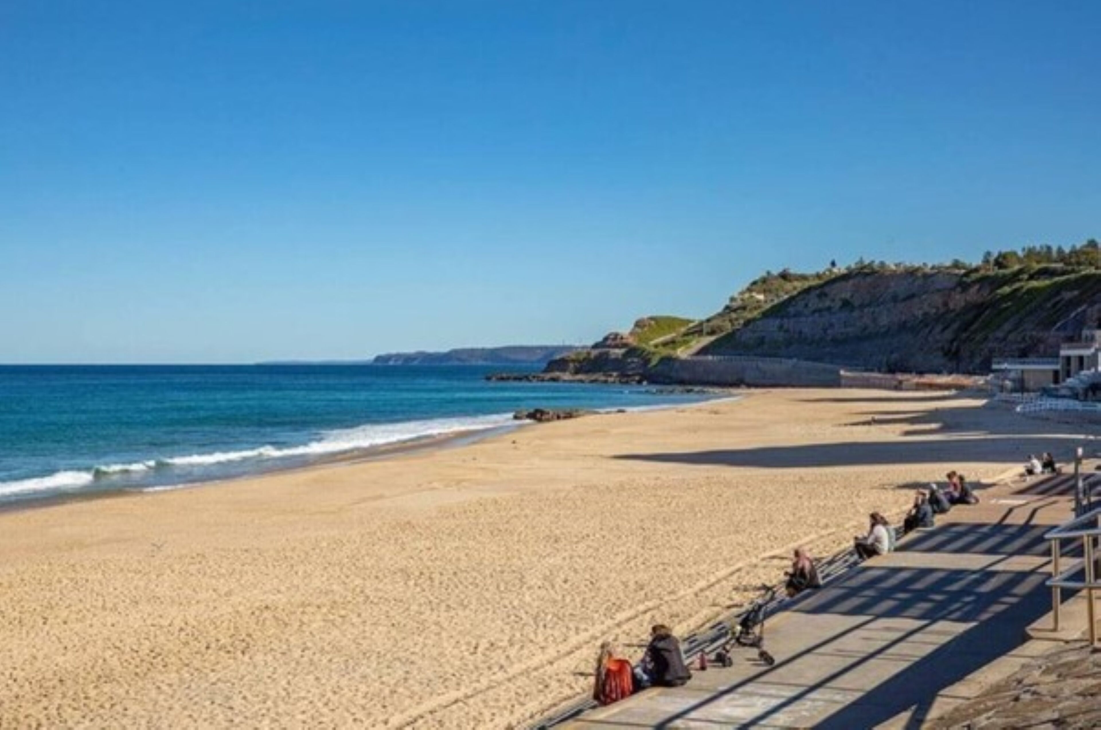 On the beach, sun loungers, beach towels