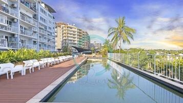 Indoor pool, pool umbrellas, sun loungers