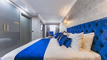 Suite estàndard | Roba de llit hipoal·lergògena, minibar i caixa forta a l'habitació