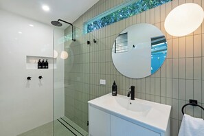 Shower, towels, soap, shampoo