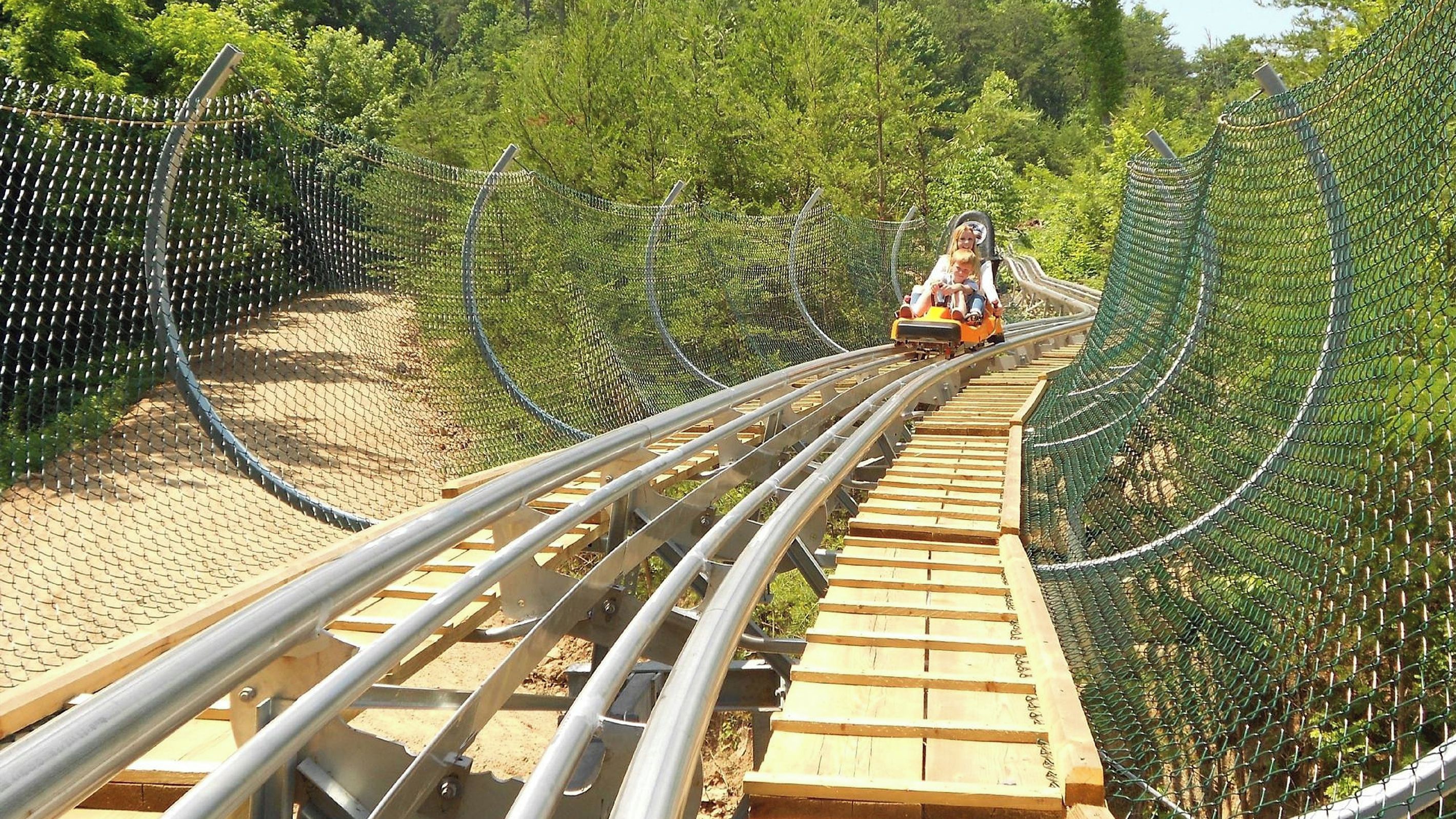 Hold on tight and get ready for an unforgettable ride at the Smoky Mountain Coaster!