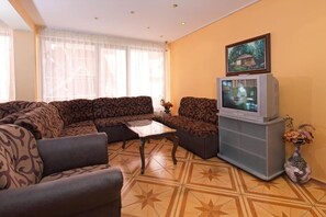Family Penthouse | Living area | 32-inch LCD TV with cable channels