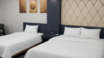 Deluxe Triple No Bathtub with Casual Breakfast | Hypo-allergenic bedding, down comforters, free minibar, desk