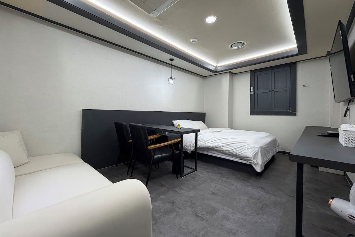 Deluxe Double Room | Peralatan tempat tidur hipoalergenik, gebar bulu kapas