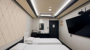 Habitació doble empresarial | Roba de llit hipoal·lergògena, cobrellits, minibar gratuït i escriptori