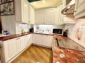 Fridge, microwave, coffee/tea maker, toaster
