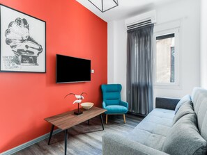 Studio, useita makuuhuoneita, parveke | Oleskelualue