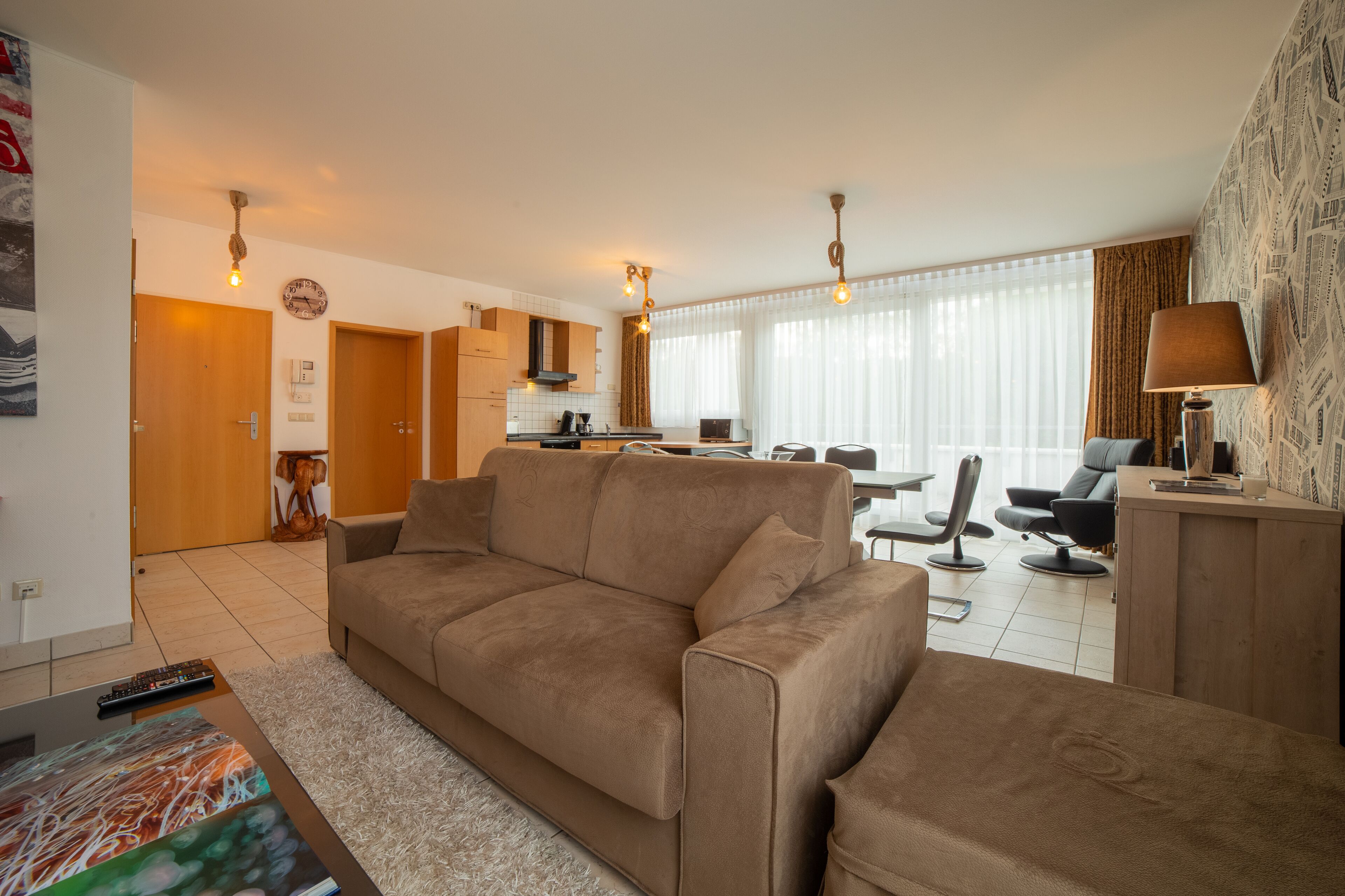 Deluxe Apartment | Living area | 32-inch TV with digital channels