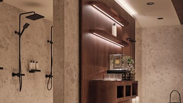 Enjoy a refreshing shower in this modern bathroom with a shower and wall-mounted faucet.