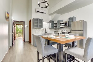 Fridge, microwave, stovetop, coffee/tea maker