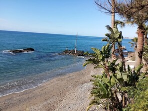 On the beach, white sand, 2 beach bars