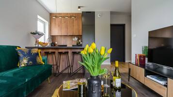 City Apartment | Desk, soundproofing, iron/ironing board, cots/infant beds