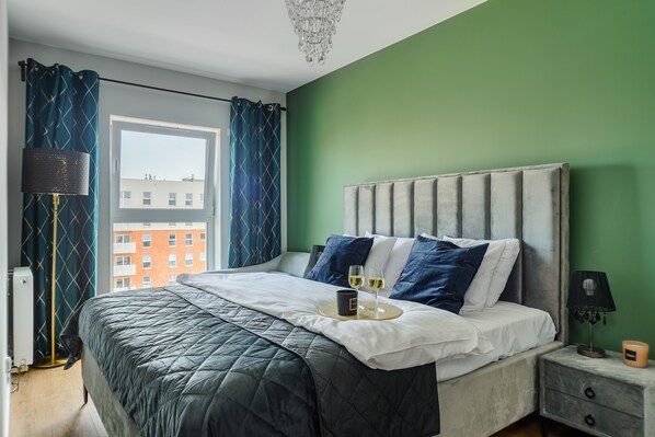 Classic Apartment | Desk, blackout drapes, iron/ironing board, cribs/infant beds