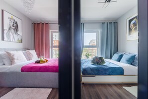 City Apartment | Desk, blackout curtains, iron/ironing board, cots/infant beds