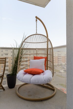 Classic Apartment | Living area | 50-inch TV with digital channels