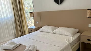 Desk, laptop workspace, blackout curtains, soundproofing