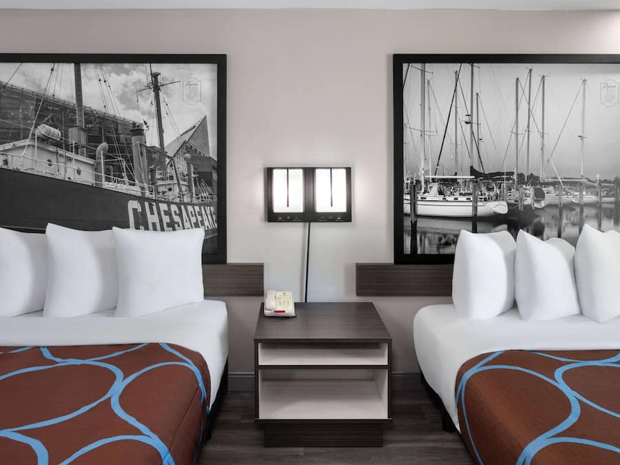 Desk, laptop workspace, bed sheets