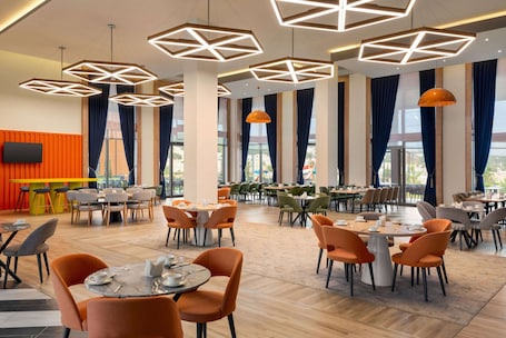 Dining. Ramada Encore By Wyndham Zomin