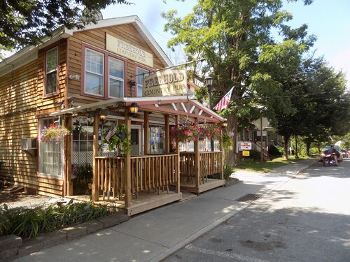 Quaint 1890's farmhouse remodeled maintaining its charm, ambiance & character.