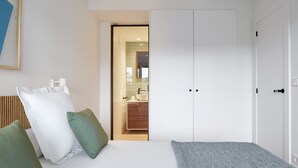 A bedroom with a bed, pillows, and a wardrobe. - COMFORTABLE AND BRAND NEW APARTMENT (Zarautz)